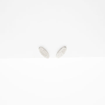 Aretes Ovalados Con Glitter Plateado