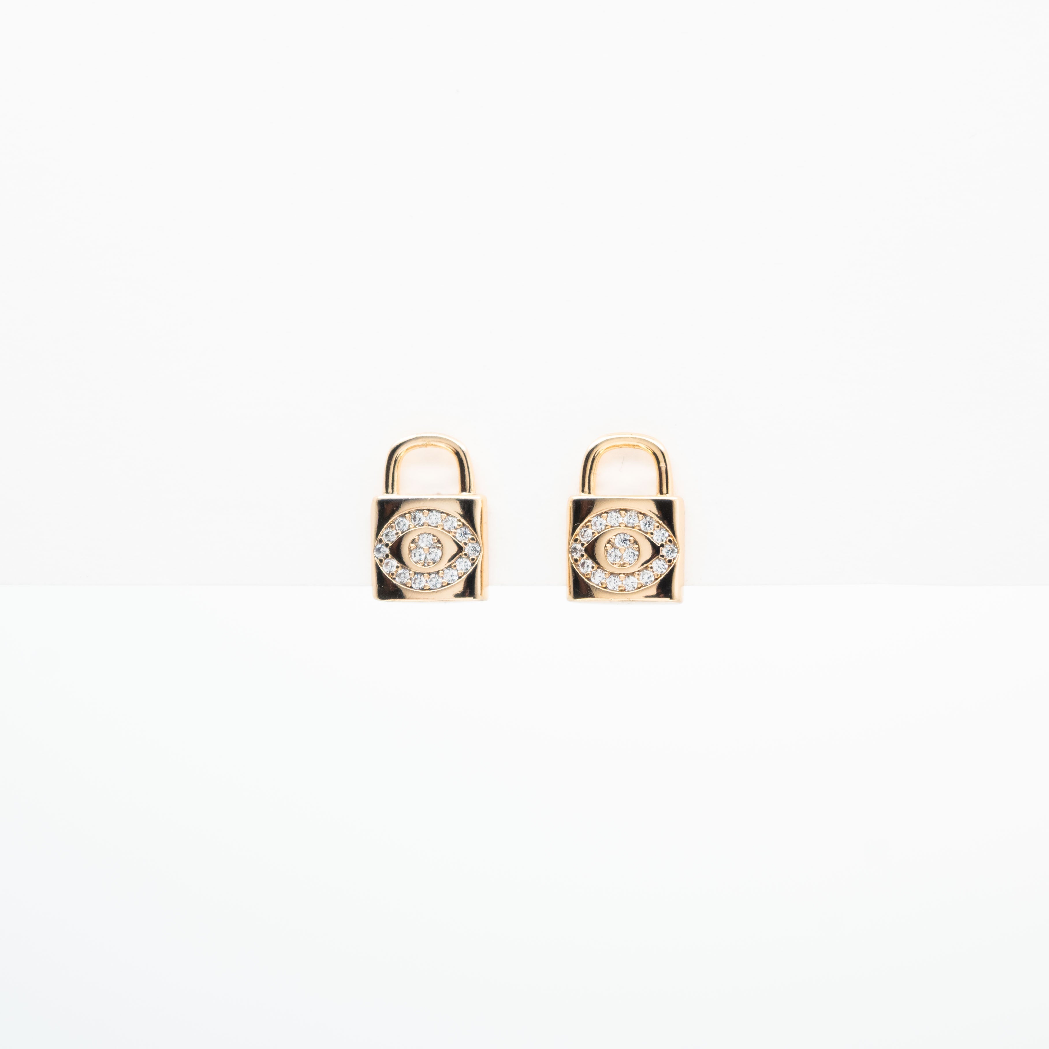 Aretes De Candado Y Ojos Strass
