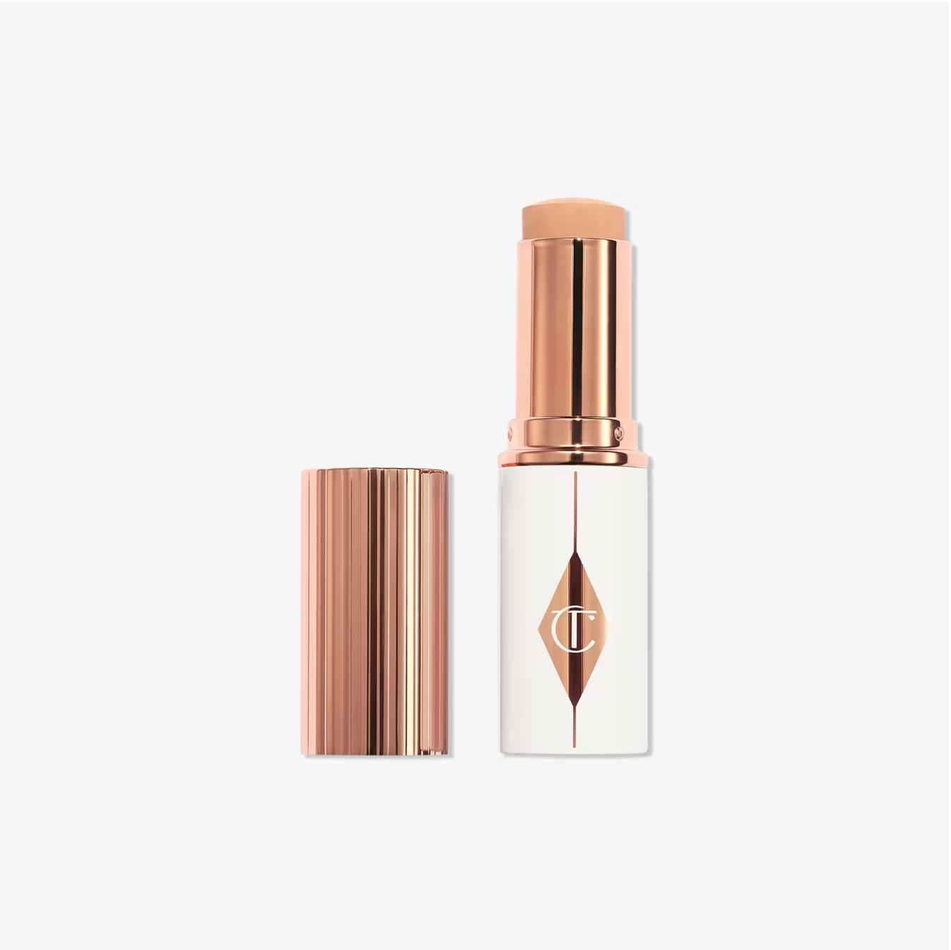 Charlotte Tilbury Unreal Skin Sheer Glow Tint Base en Barra Hidratante