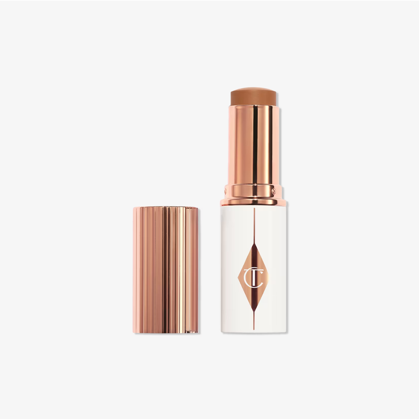 Charlotte Tilbury Unreal Skin Sheer Glow Tint Base en Barra Hidratante