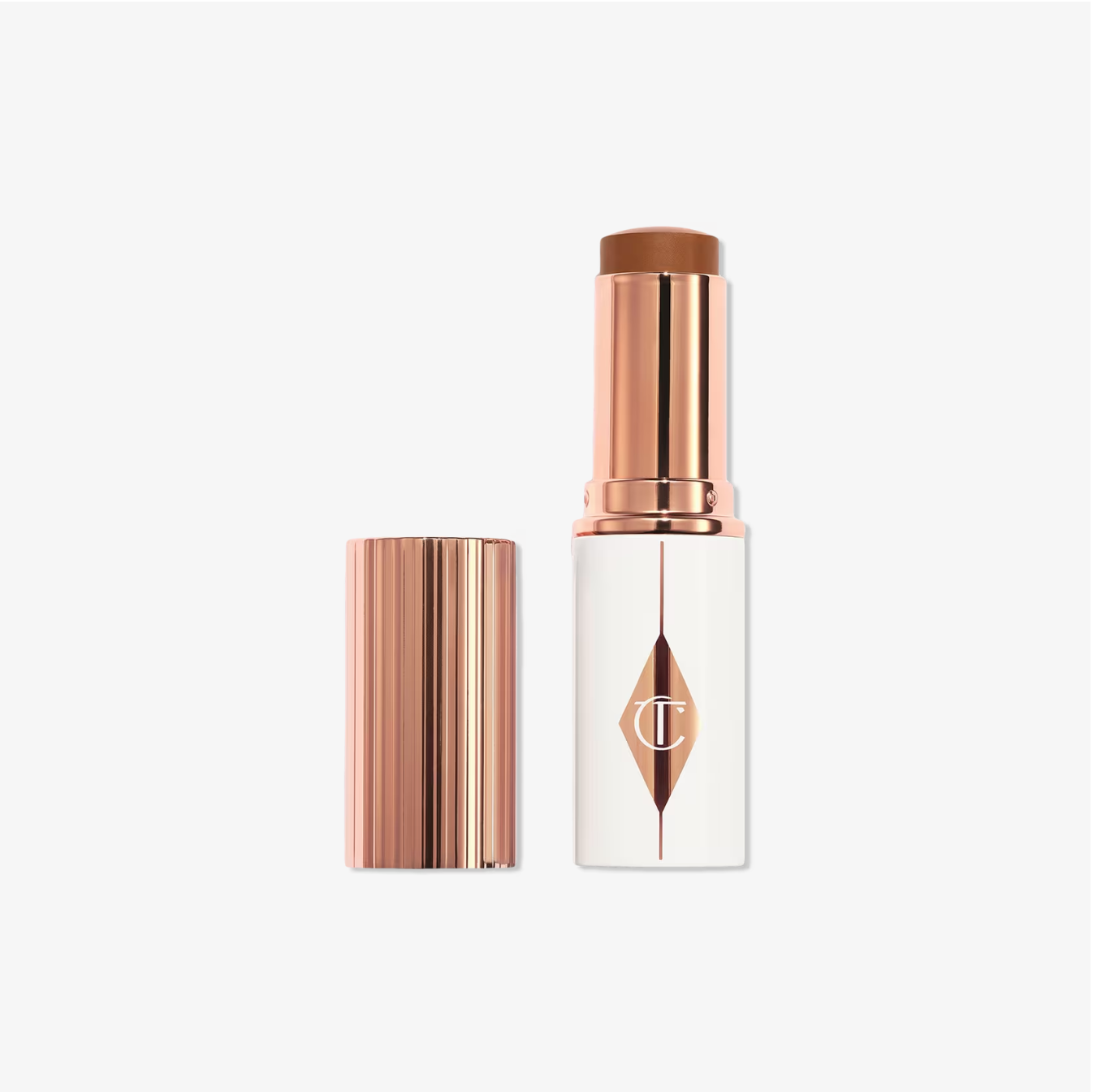 Charlotte Tilbury Unreal Skin Sheer Glow Tint Base en Barra Hidratante
