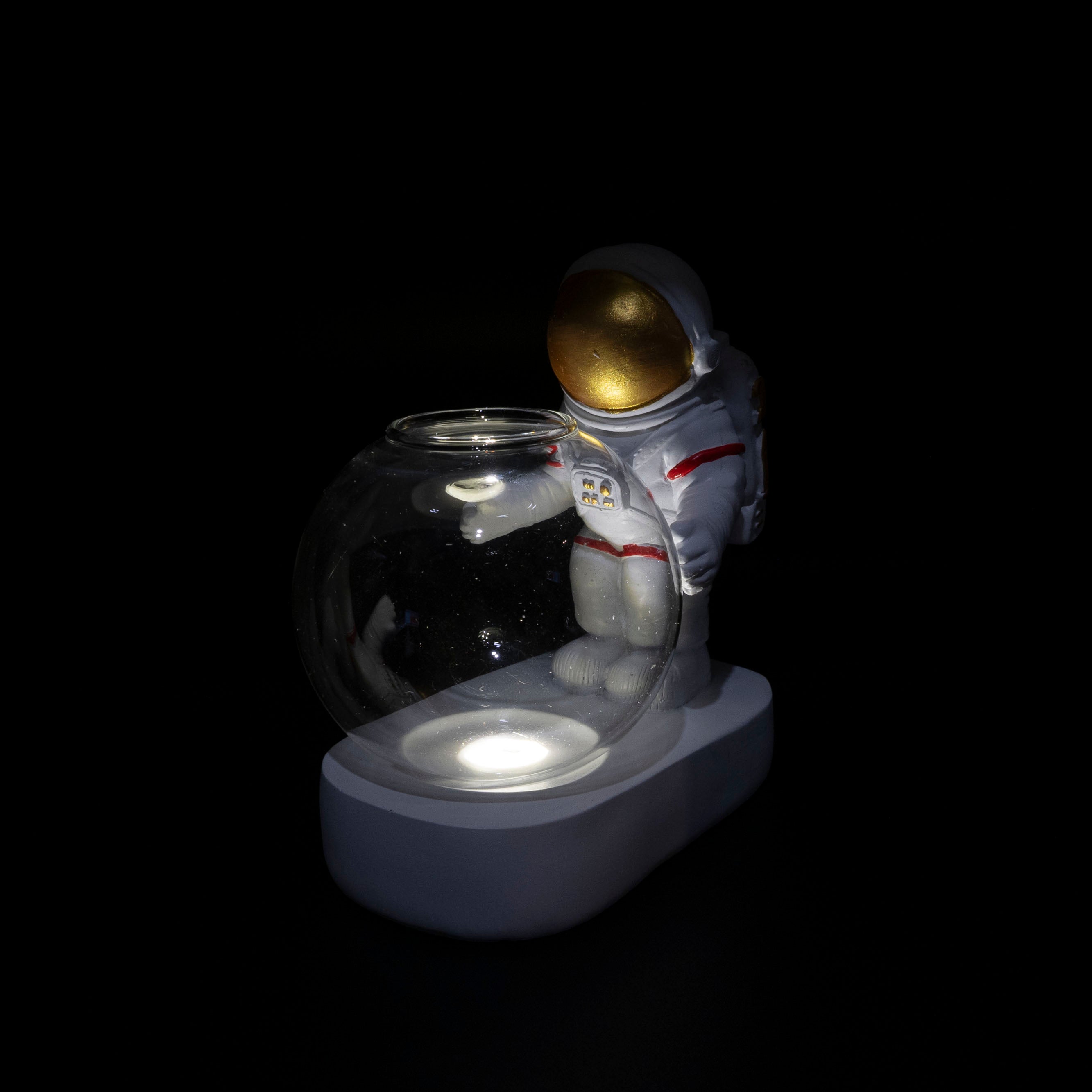 Maceta de astronauta con lámpara